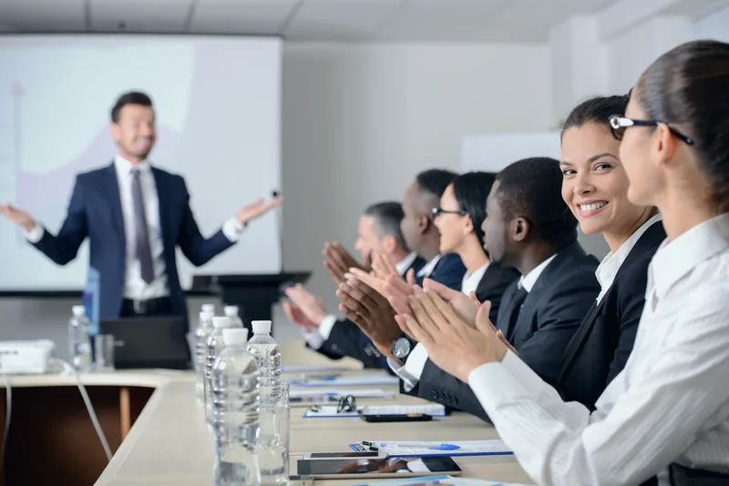 Team applauding a presentation